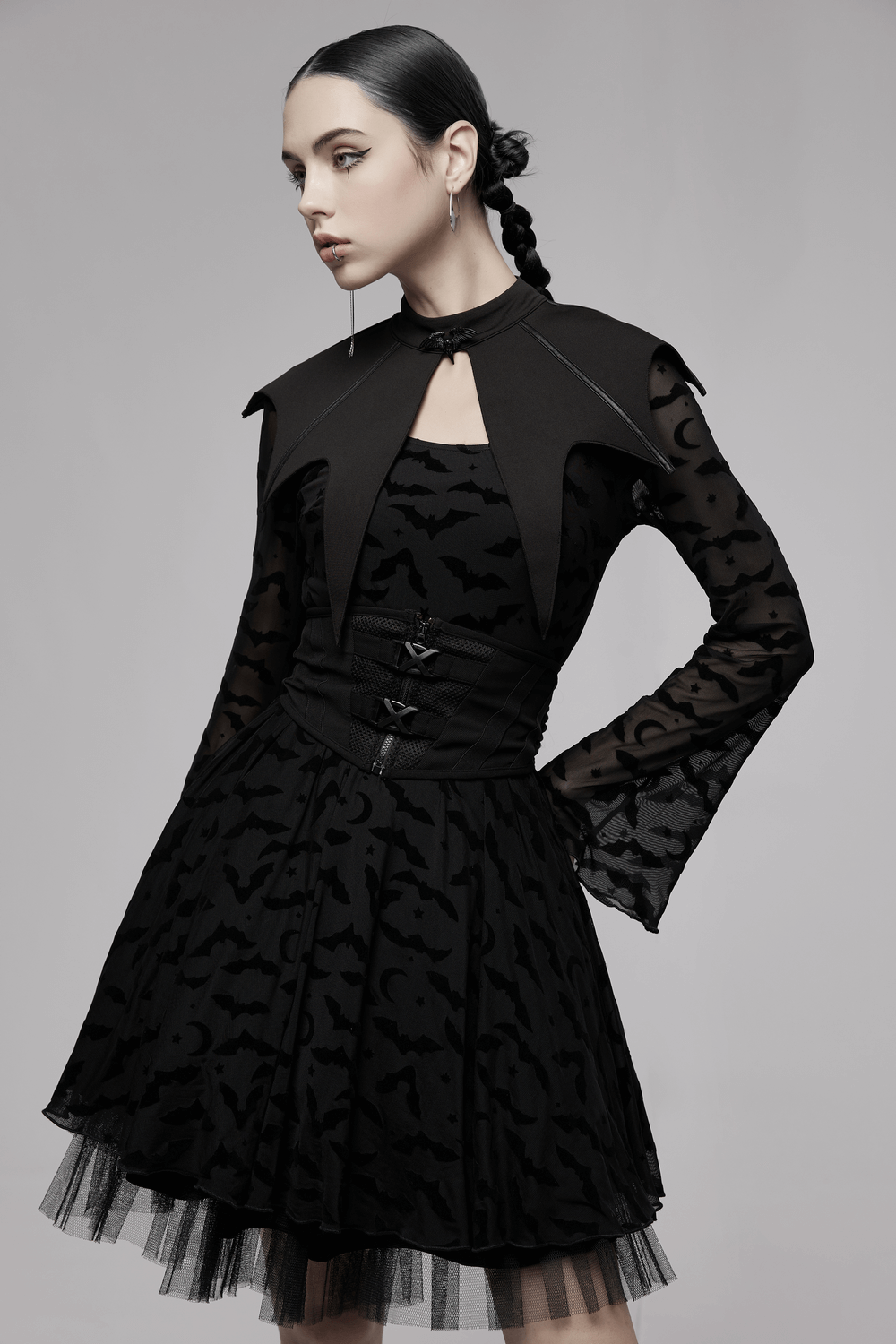 Model wearing a Women's Dark Gothic Bat Cape with black bat wing design and dramatic silhouette.