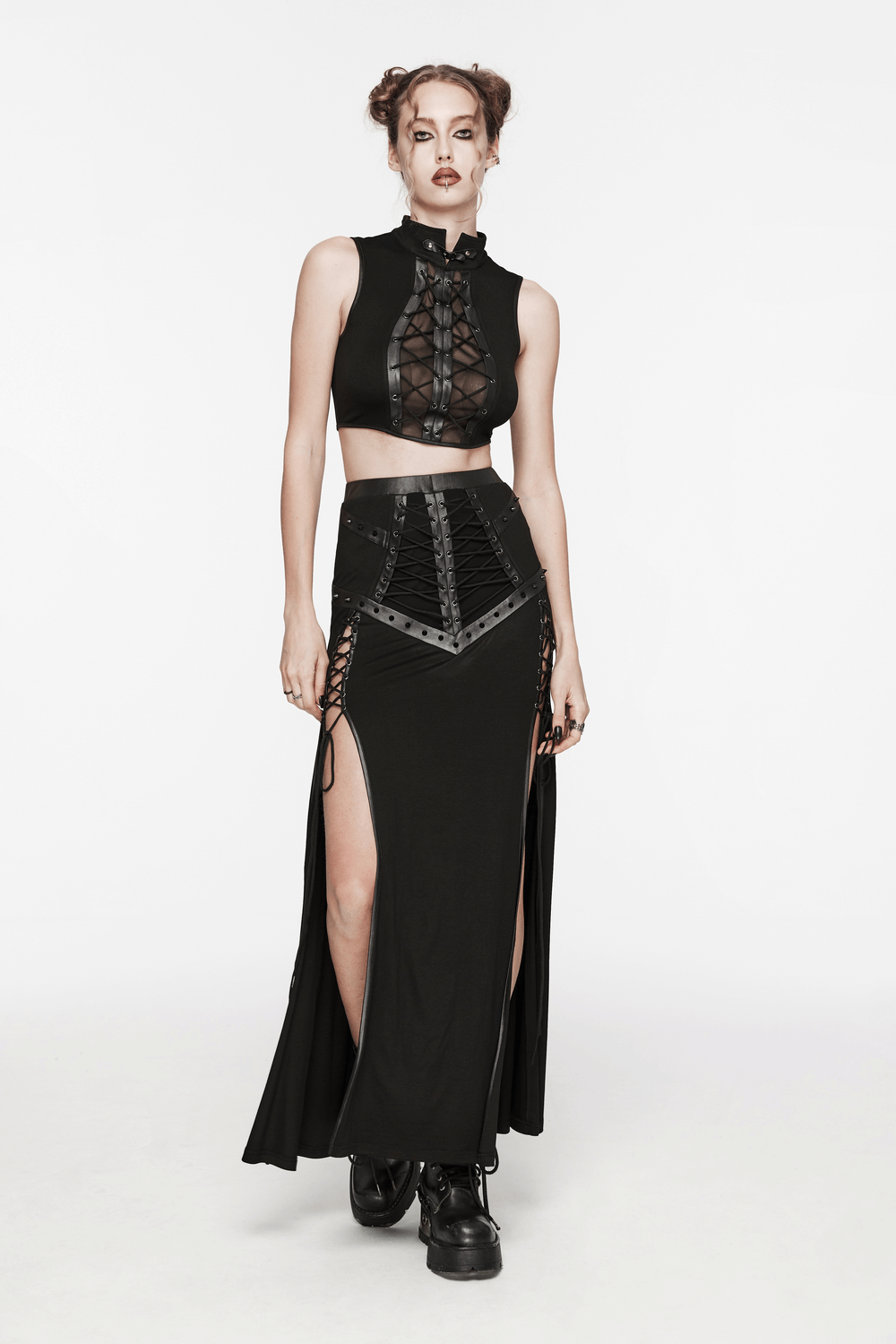 Women's edgy long skirt with mesh slits and drawstrings in punk style, paired with a trendy cropped top.