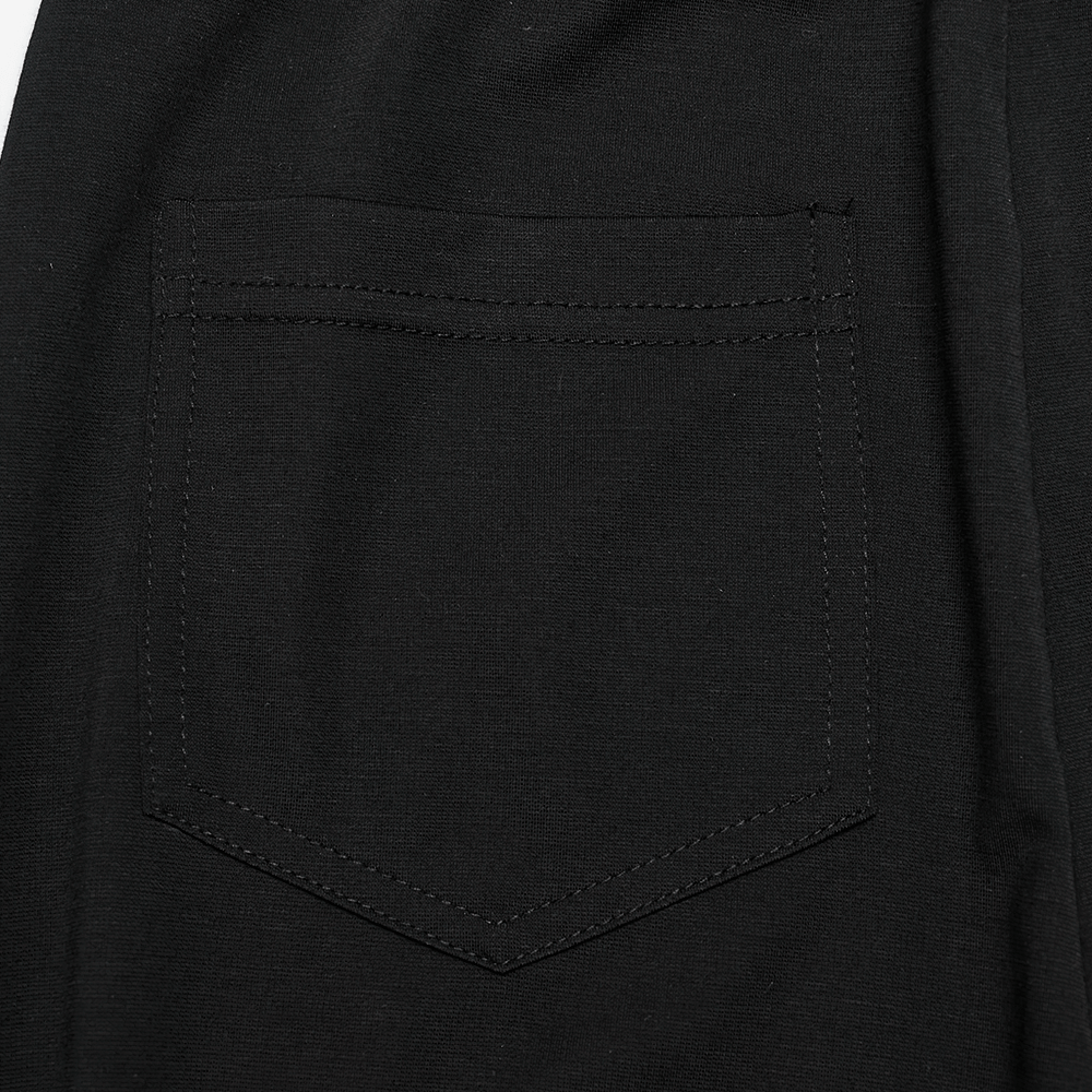 Close-up of the back pocket detail on women's elastic black leggings with lace decal design.