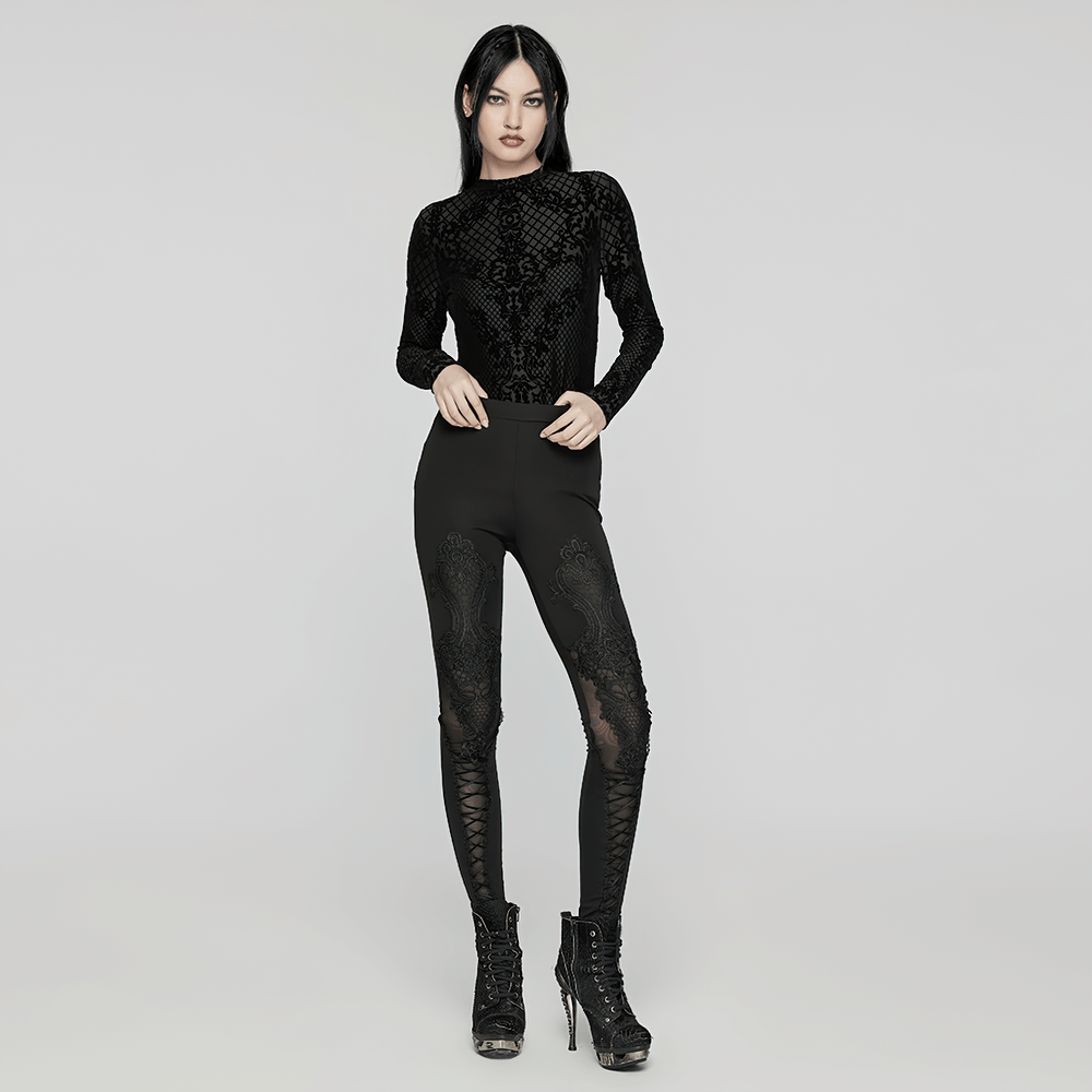 Trendy women's black leggings with lace decals and stylish drawstrings, perfect for a gothic-inspired look.