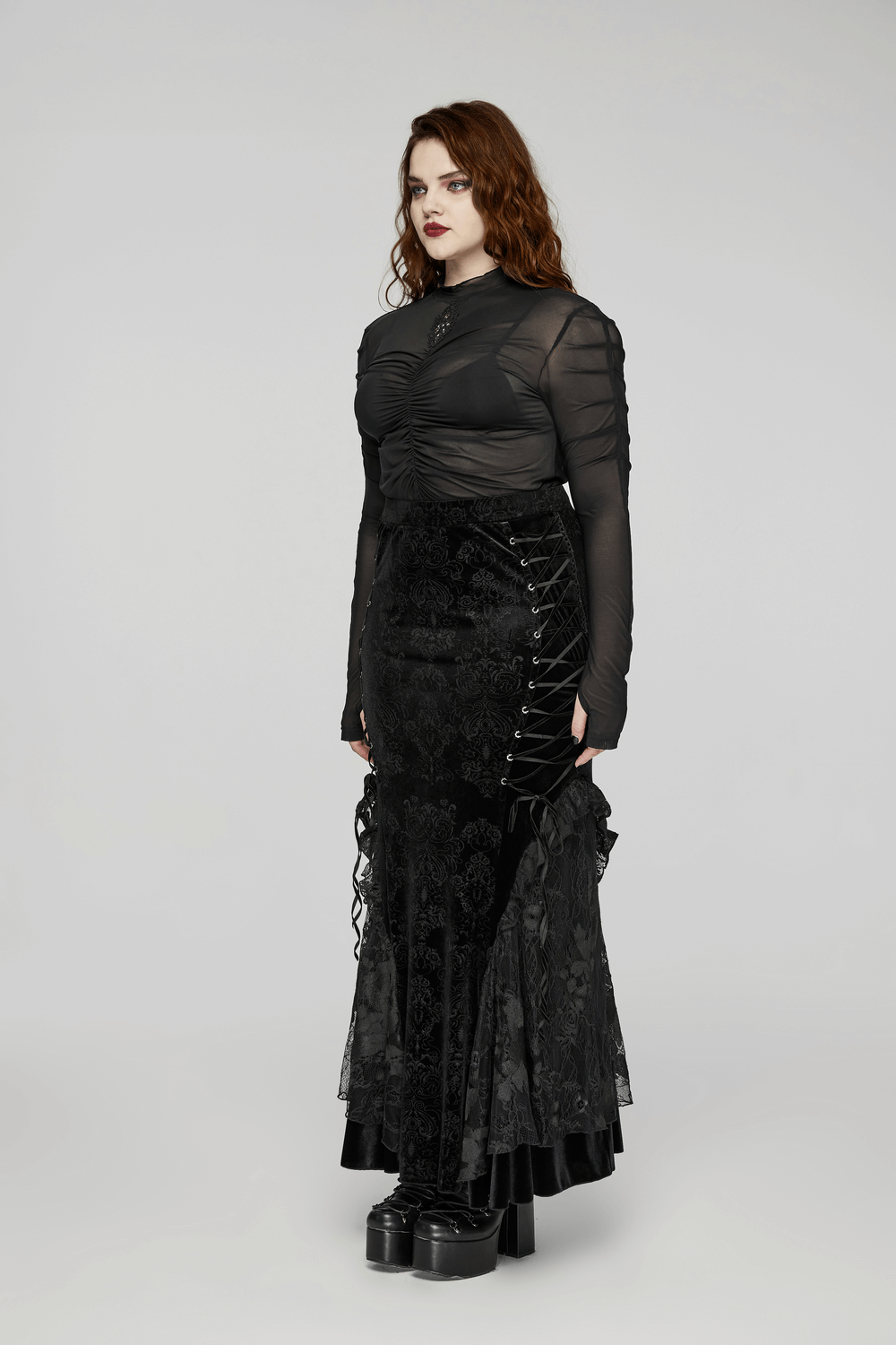 Gothic women's elastic mesh top with pleats and black lace skirt, showcasing an elegant stylish look.