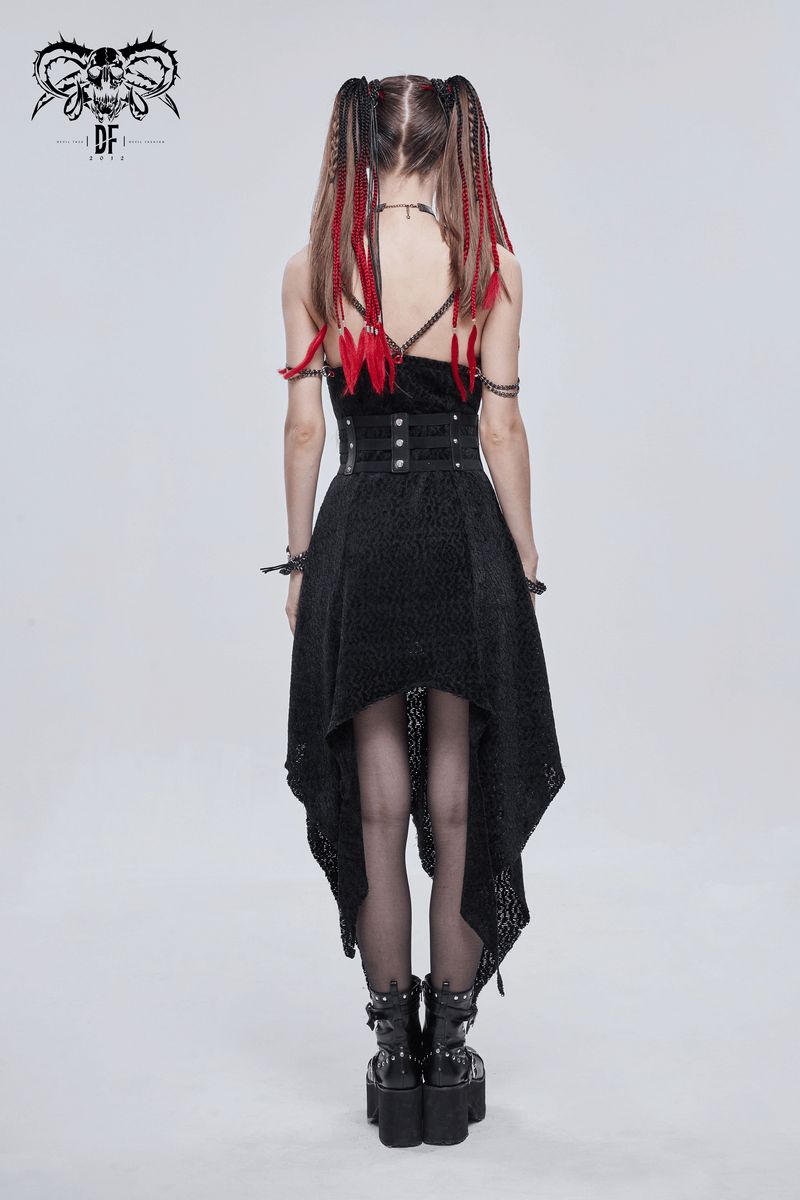 Back view of a woman in a punk style dress with a black elastic PU leather belt and red braided hair.