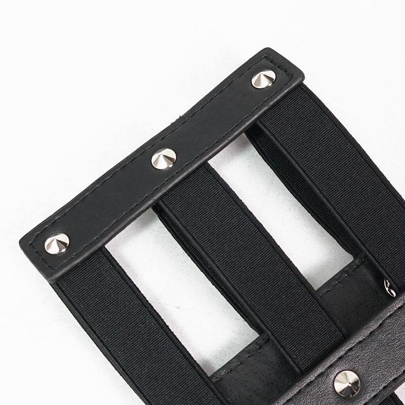 Close-up of women's punk style PU leather belt with rivet details and adjustable straps, showcasing its unique design.