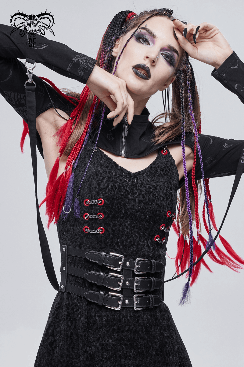 Edgy woman in a black dress with a punk-style PU leather belt featuring adjustable buckles and silver rivets.