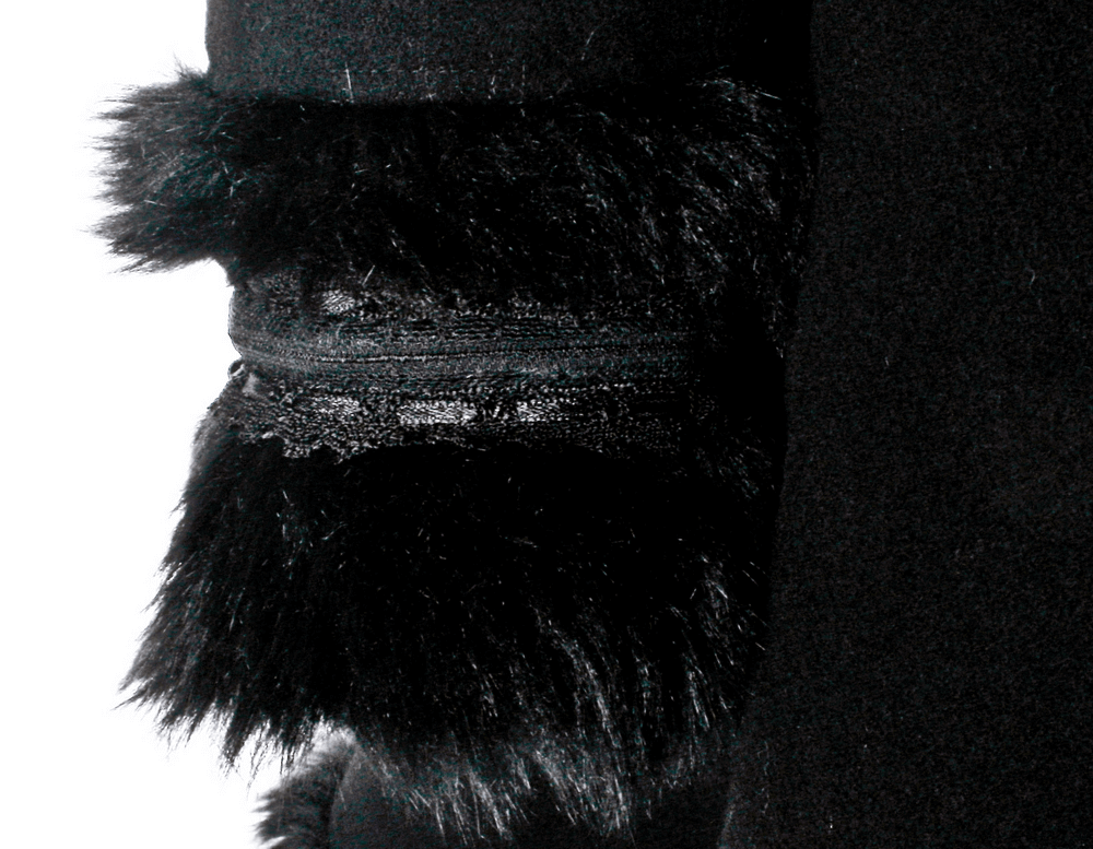 Close-up of luxurious faux fur trimming on a women's gothic hooded woolen coat.