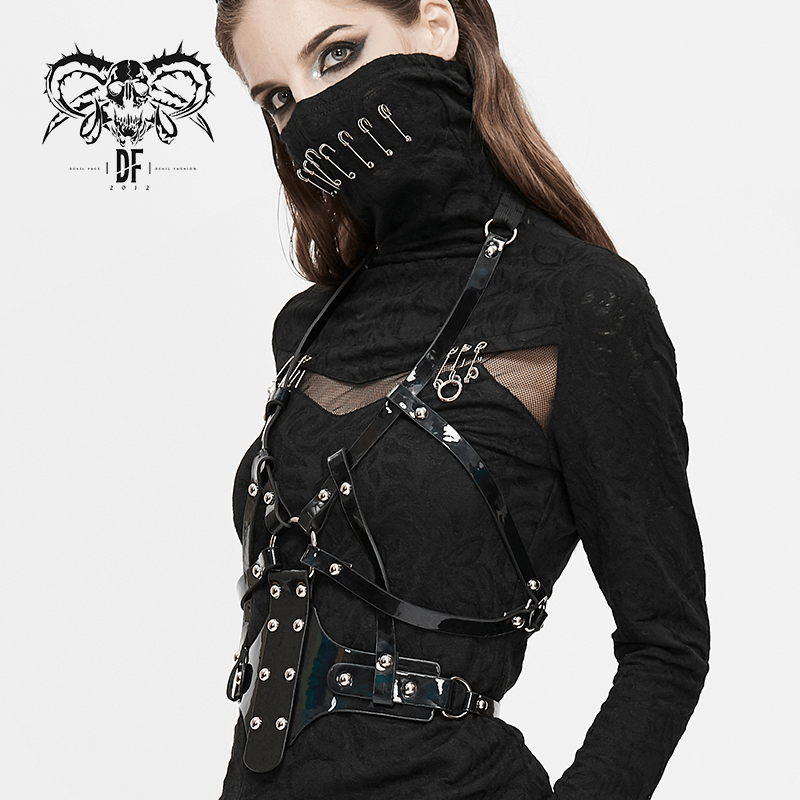 Gothic women's faux leather body harness with silver fittings and adjustable straps for cosplay elegance.