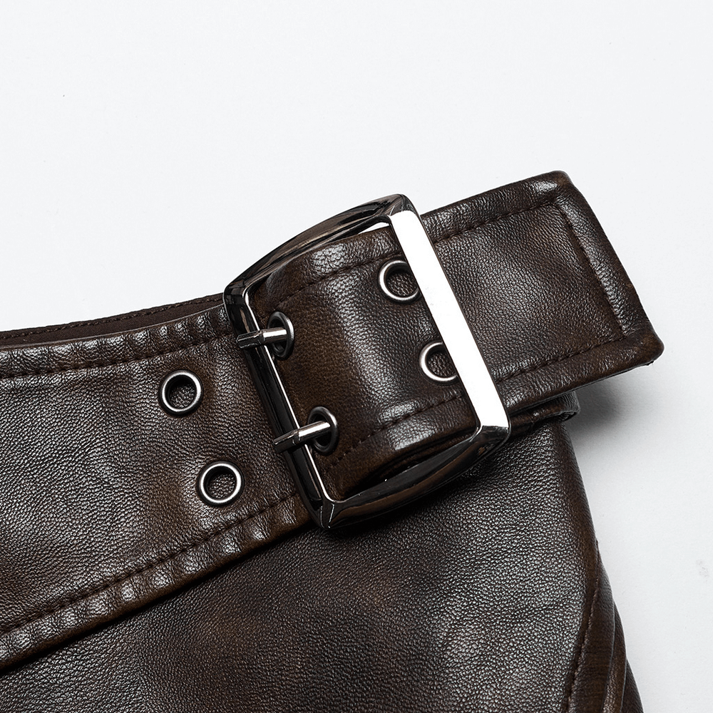 Close-up of side buckle detail on a women's coffee faux leather mini skirt showcasing its edgy design.