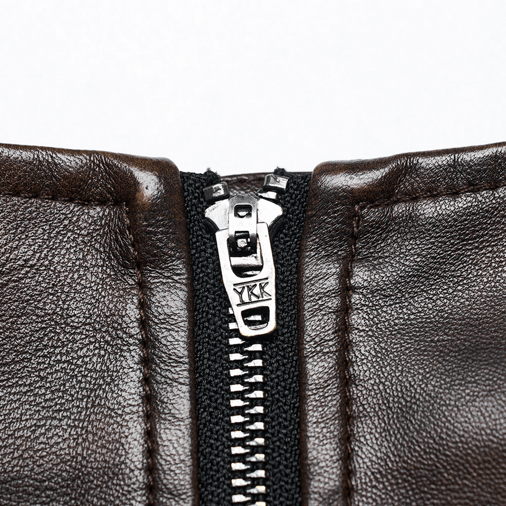 Close-up of YKK zipper on women's coffee faux leather mini skirt for edgy style and easy closure.