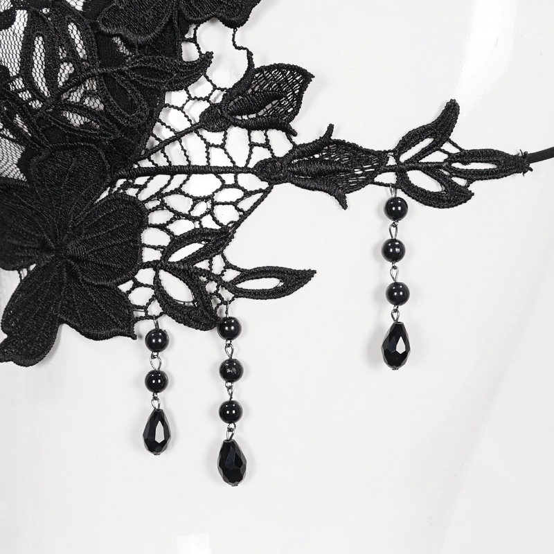 Black floral lace detail featuring elegant beaded accents for gothic lingerie style.