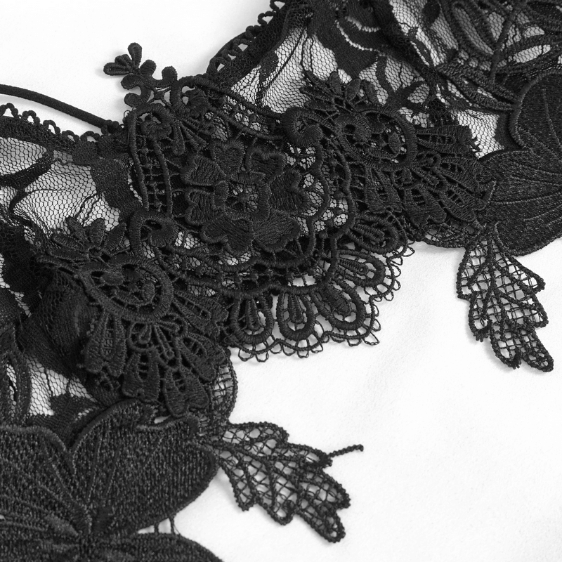 Close-up of elegant black floral lace detail featuring intricate beading, perfect for gothic lingerie style.