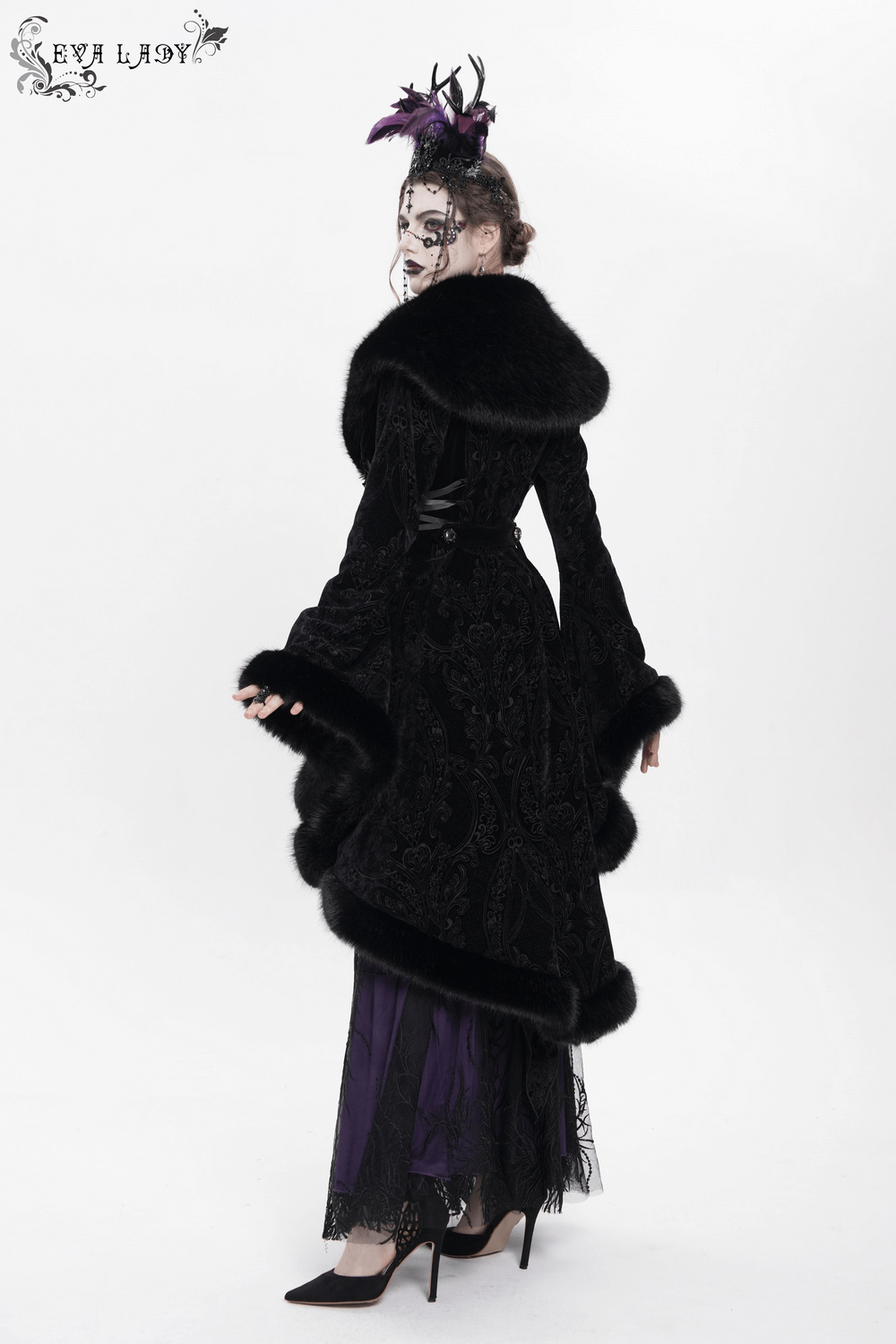 Elegant black fur-trimmed coat with lace-up waist, showcasing vintage Gothic style and dramatic high-low silhouette.