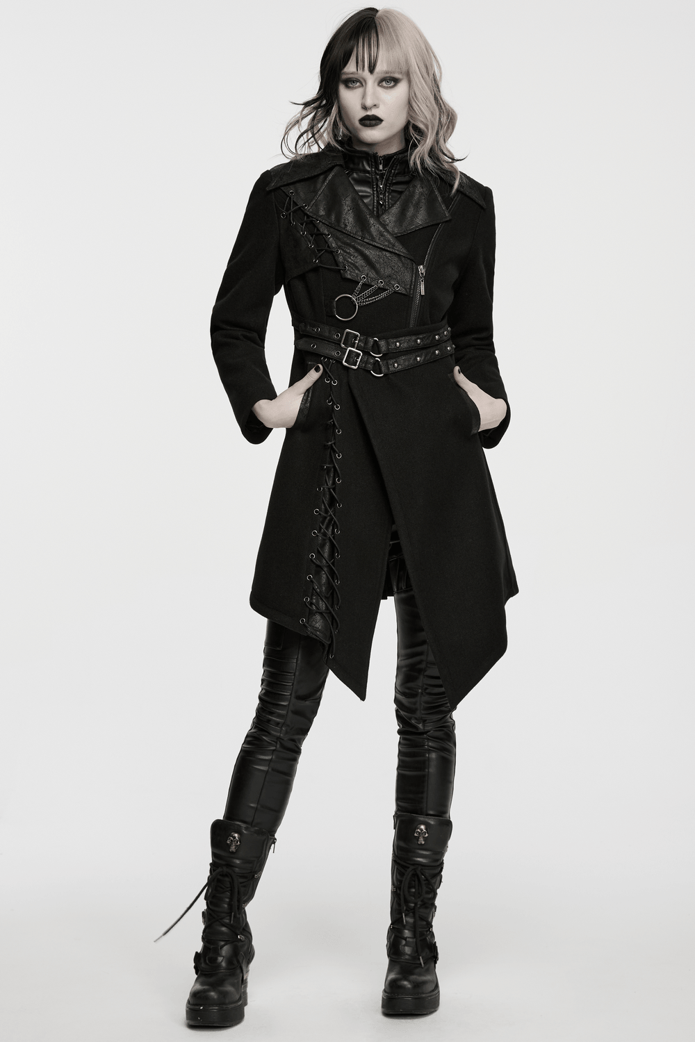 Women's Gothic Asymmetrical Coat with Buckle Details worn by a model, showcasing punk style with lace-up panels and belts.