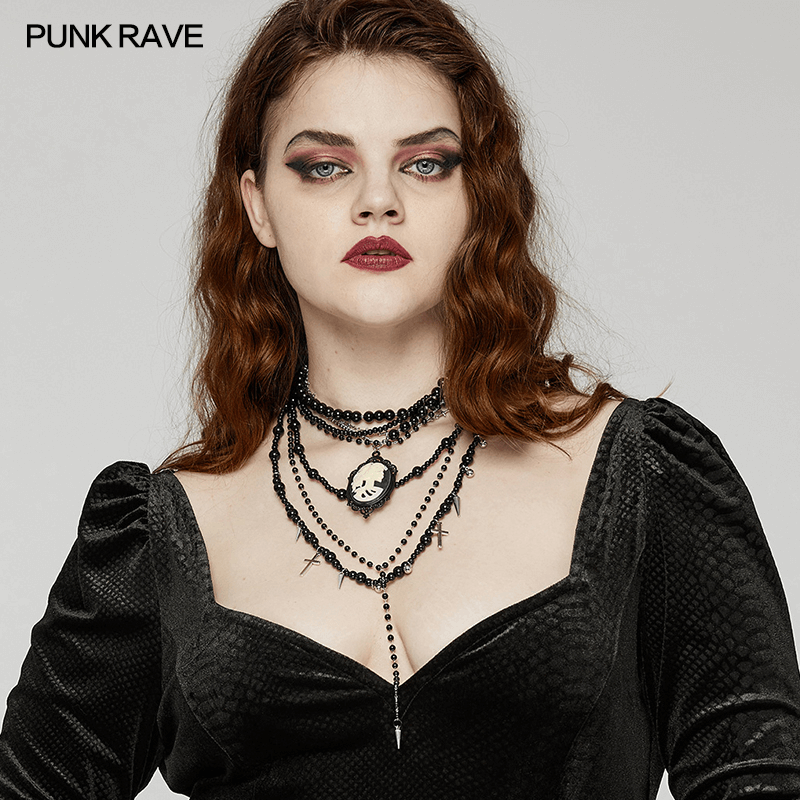 Women's Gothic black beaded necklace with cross pendants and skull cameo, perfect for Victorian-inspired outfits.
