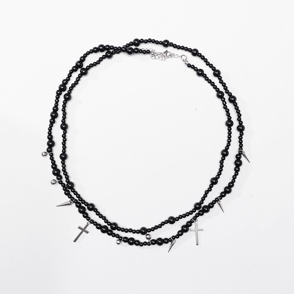 Women's Gothic black beaded necklace with cross pendants, featuring layered chains and striking skull cameo.