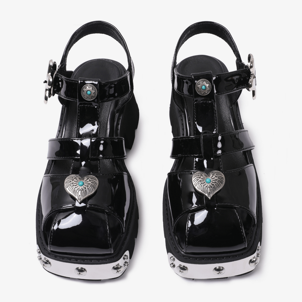 Women's Gothic Black Patent Platform Fisherman Sandals with heart charms, chunky lug soles, and caged black straps