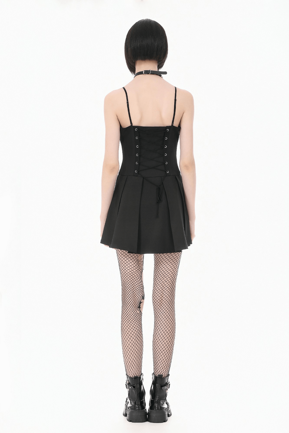 Back view of Women's Gothic Buckle Corset Mini Dress with Pleated Skirt, showcasing lace-up detail and tiered pleated skirt.