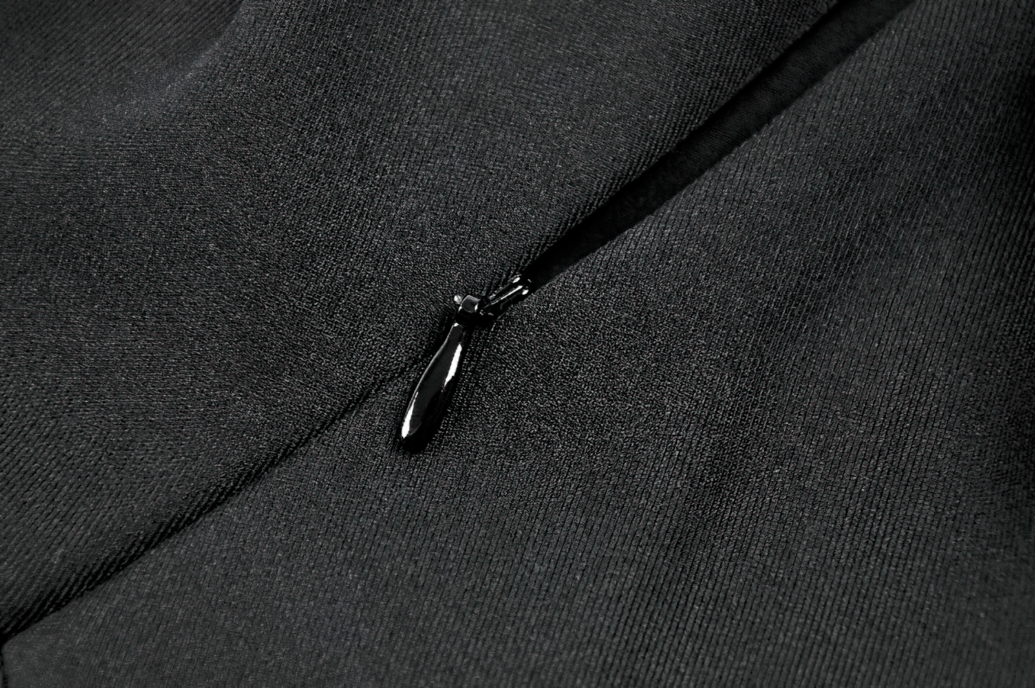 Close-up of the zipper detail on the Women's Gothic Buckle Corset Mini Dress with Pleated Skirt.