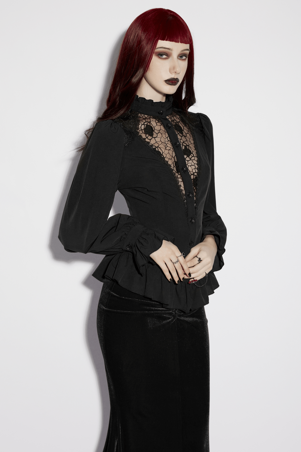Women's Gothic Chiffon Lace Blouse with Ruffle Collar shown on model with dark hair and a chic gothic style.
