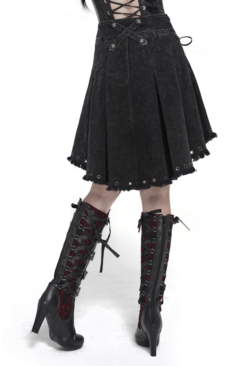 Women's Gothic Denim Skirt with Lace-Up Strap Details showcasing a pleated silhouette and punk grommet accents.