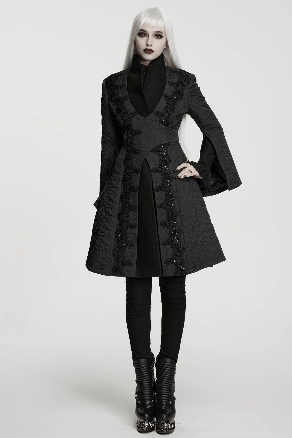 Women's Gothic Embroidered Black A-Line Victorian Coat worn by a model with a stylish look in a minimalist setting.