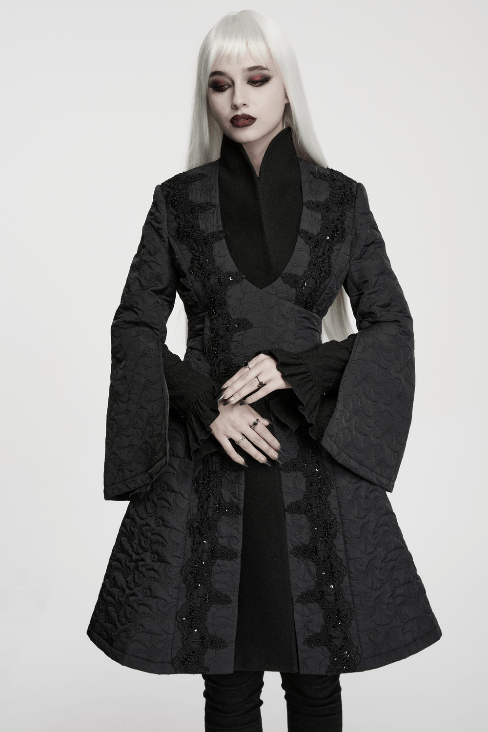 Women's Gothic Embroidered Black A-Line Victorian Coat featuring intricate designs and elegant bell sleeves.