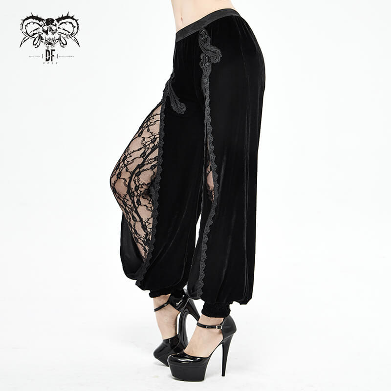 Women's gothic black velvet flared pants with lace inserts, showcasing fashion-forward style and elegance.