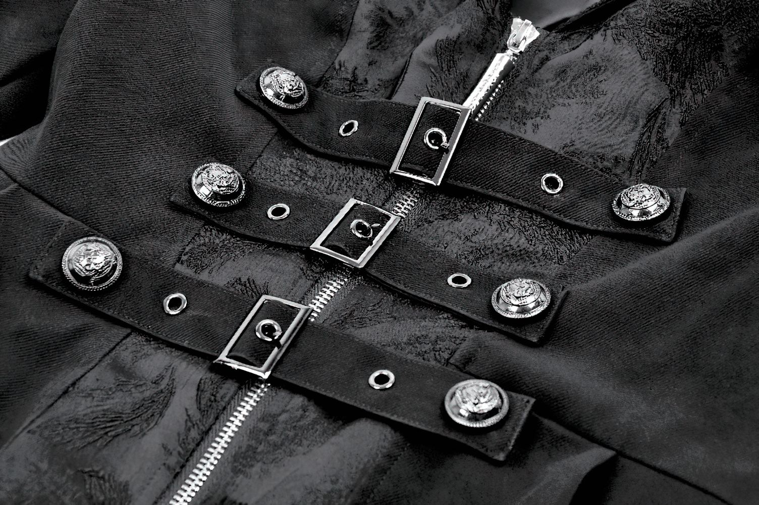 Close-up view of Women's Gothic High-Low Coat with Buckles and Lace-Up featuring metal buckle straps and decorative buttons.