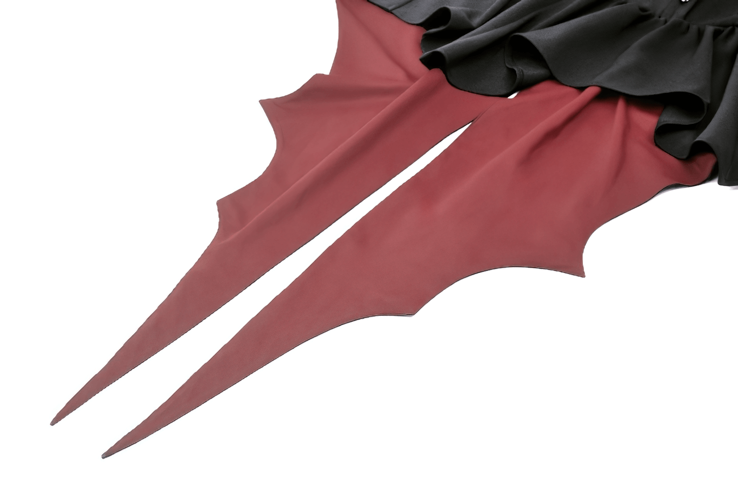 Detail of gothic high-low dress hem with dramatic red ruffles for a striking statement look.