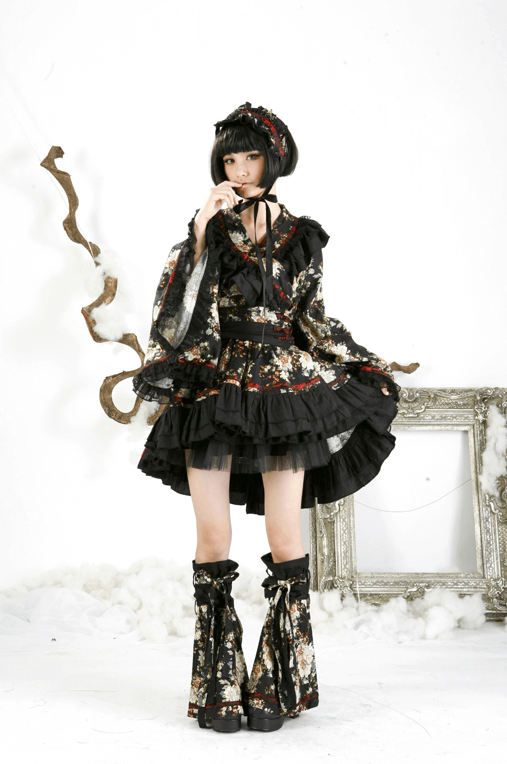 Women’s Gothic Lolita Dress with floral pattern, ruffles, and lace. Perfect for themed events and cosplay.