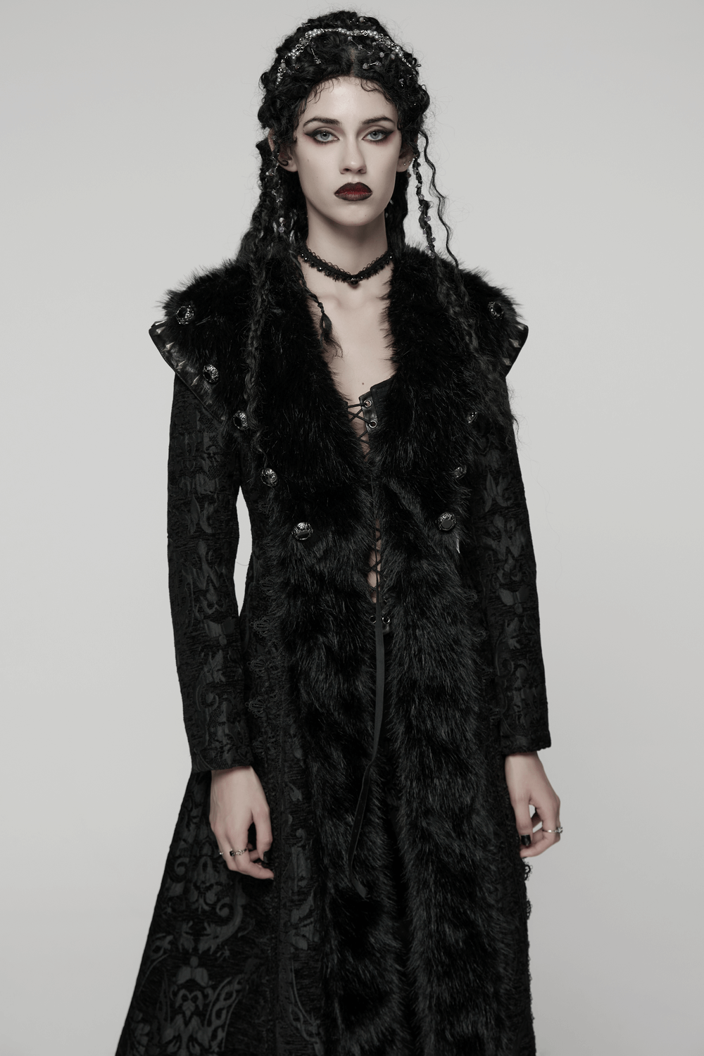 Women's Gothic Jacquard Plush Long Coat with Fur Trim displayed on a model, showcasing its dark elegance and plush details.