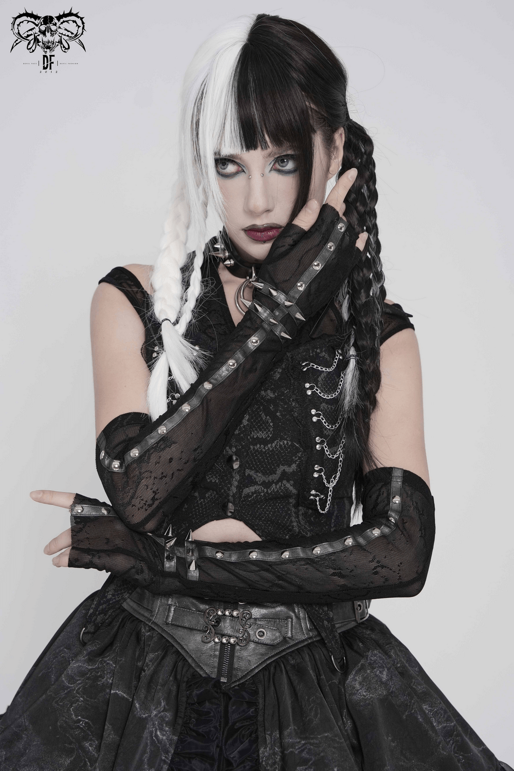 Women's Gothic Lace Arm Sleeves with Spike Stud Cuffs worn by a model showing a stylish gothic look.
