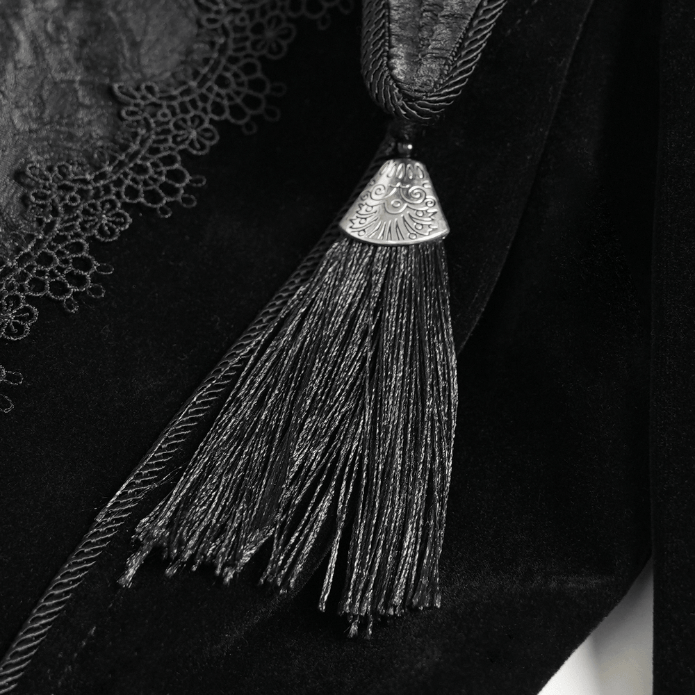 Close-up of tassel detail on Women's Gothic Lace Bell Sleeve Tailcoat Jacket, showcasing intricate design and texture.