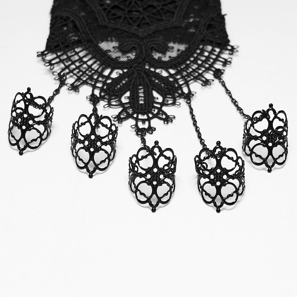 Bijou de main gothique en dentelle pour femme avec chaînes reliées aux bagues