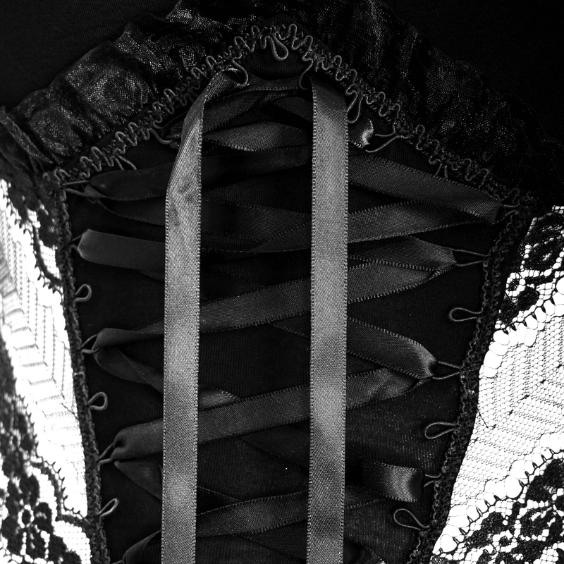 Close-up of elegant lace-up detailing on women's gothic black t-shirt with mesh inserts and puff sleeves.