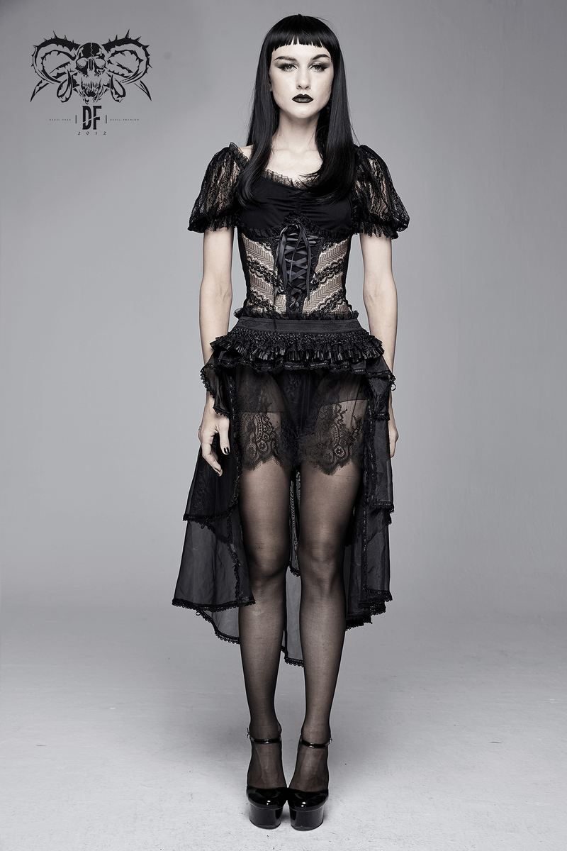 Elegant gothic woman in black lace t-shirt with puff sleeves and lace-up detail, showcasing dark fashion style.