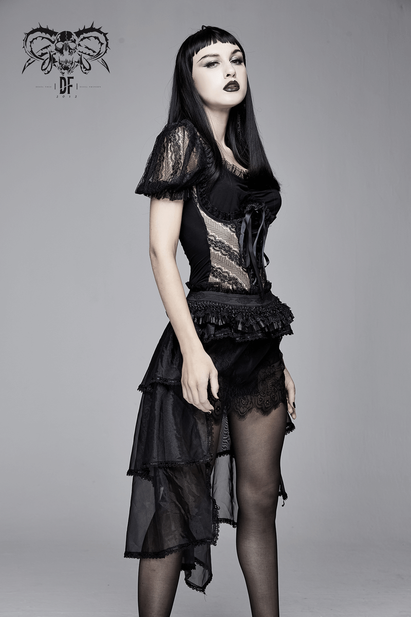Model in a black gothic lace t-shirt with puff sleeves and a layered skirt, showcasing an elegant gothic style.