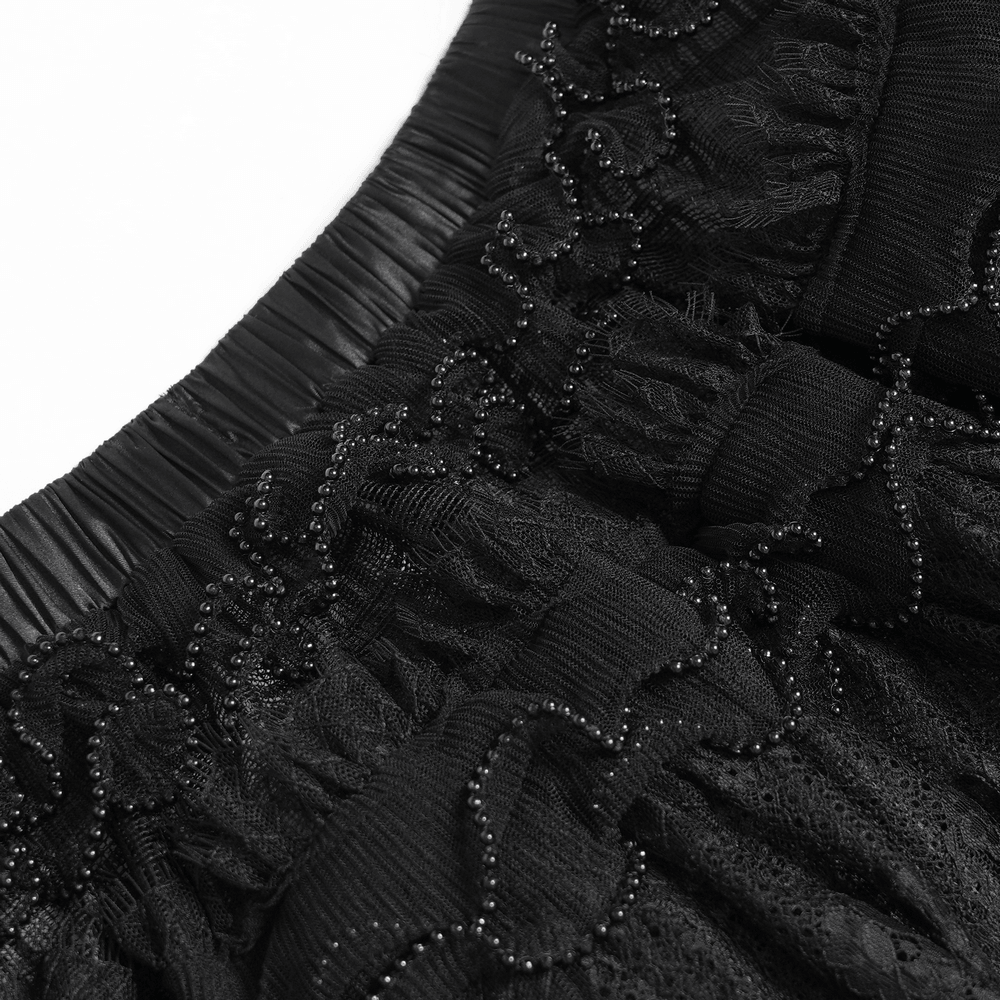 Close-up of Women's Gothic Lace Ruffle Mini Skirt with Layered Trim showcasing intricate detailing and ruffles.