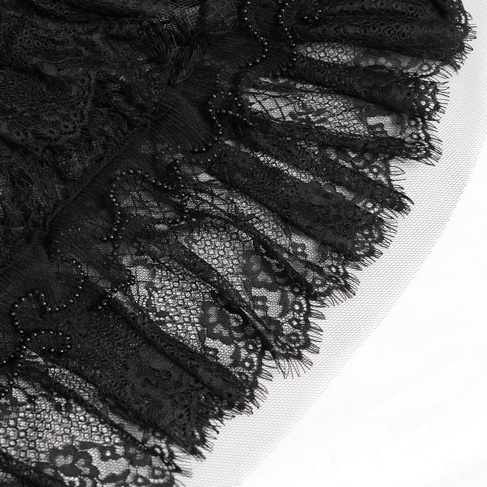 Close-up of Women's Gothic Lace Ruffle Mini Skirt with Layered Trim showcasing intricate lace and ruffles.