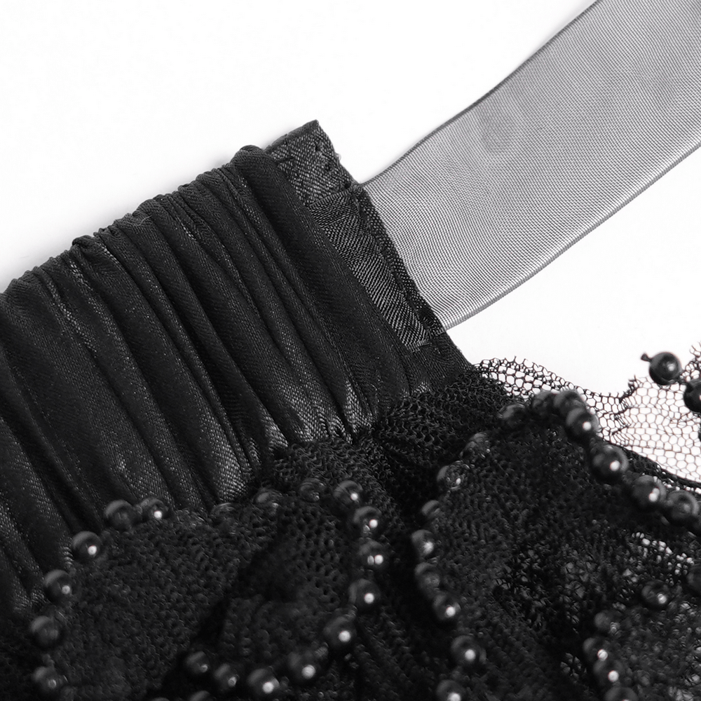 Close-up of the waistband detailing on Women's Gothic Lace Ruffle Mini Skirt with Layered Trim.