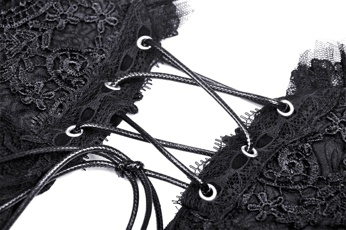 Close-up of intricate black lace fabric with corset lacing detail, enhancing gothic elegance and allure.