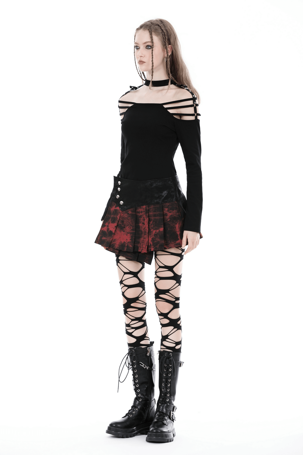 Model showcasing a Women's Gothic Mini Skirt with edgy button details and dark punk rock style outfit.
