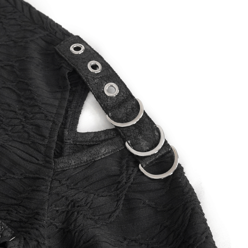 Close-up of women's gothic top details showcasing metallic studs and unique texture.