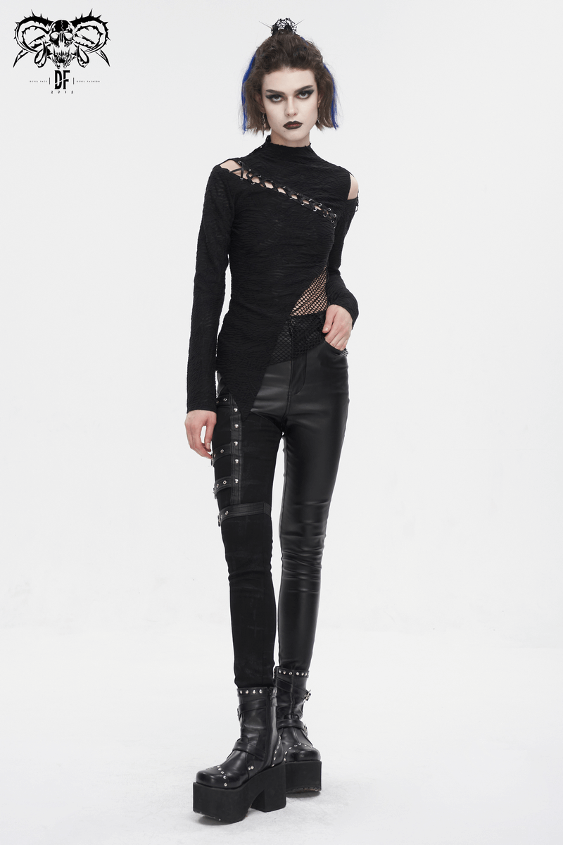 Women's gothic patchwork top with half-high neck and irregular hem, paired with edgy black leather pants and platform boots.