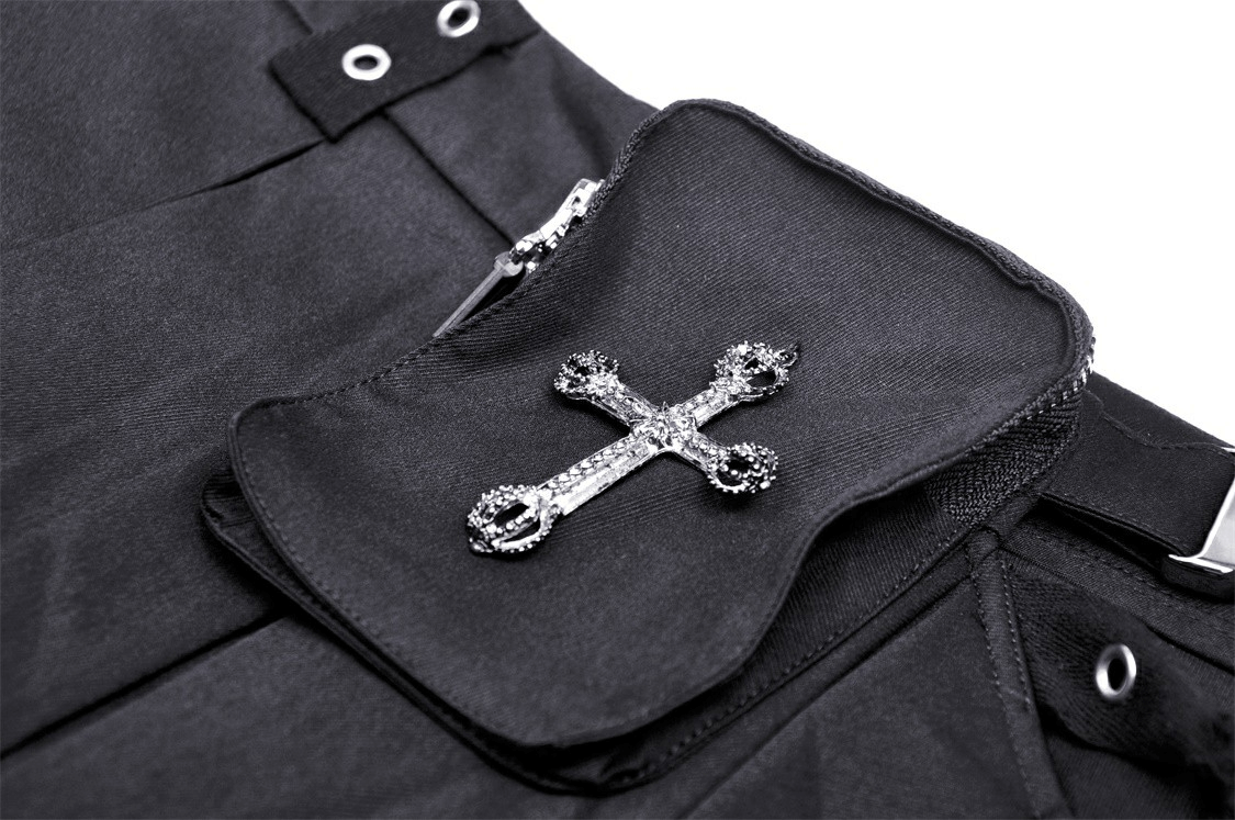 Close-up of gothic mini skirt pocket featuring a sparkling cross applique and metal accents, perfect for a dark fashion statement.