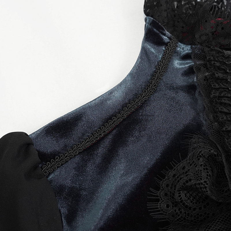 Close-up of women's gothic puff sleeve shirt showing luxurious velvet fabric and delicate lace detailing.