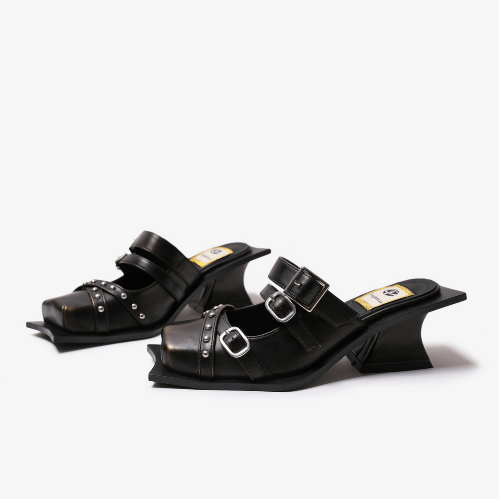 Women's Gothic Punk Buckle Strap Studded Heeled Mules in black with square toes, buckle straps and sculptural heels