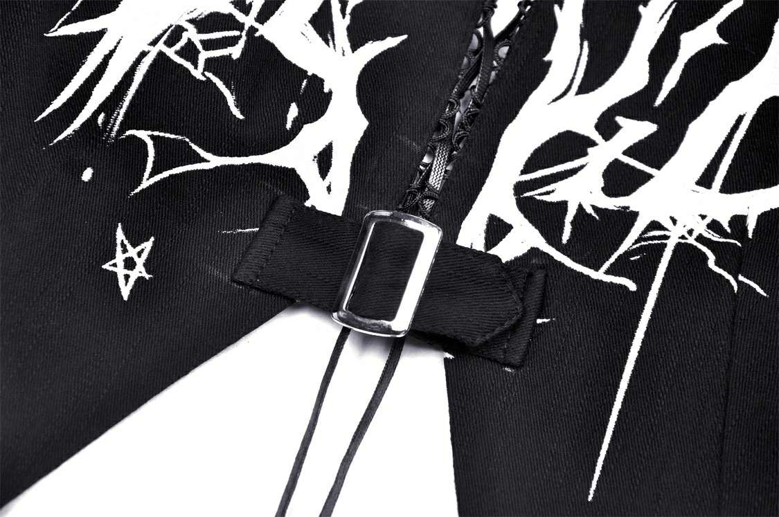 Close-up of black lace-up crop top with white gothic print and adjustable buckle detail.
