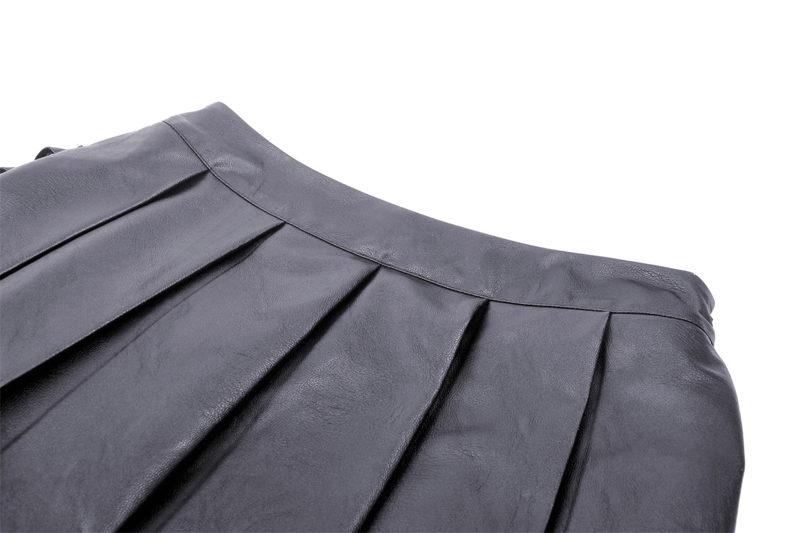Close-up of a pleated black mini skirt showcasing its stylish design and sleek finish.