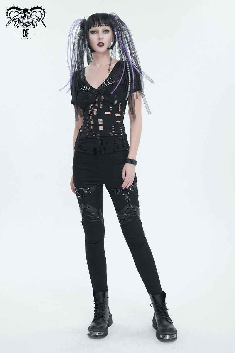 Model showcasing a women's black gothic ripped mesh T-shirt paired with stylish punk-inspired pants.