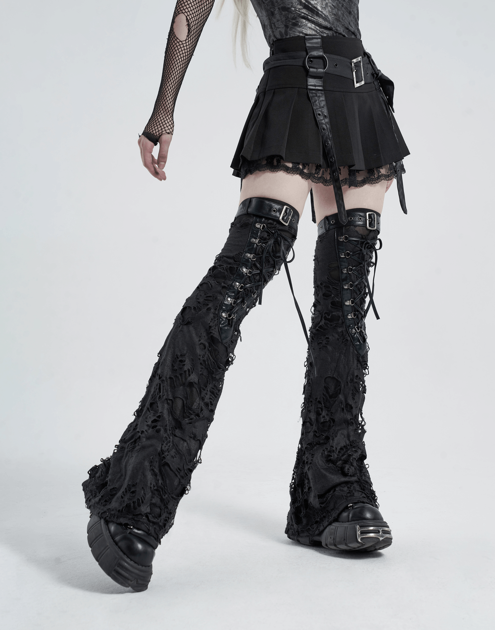Women's Gothic Ripped Strappy Long Leg Warmers in black, styled with a punk skirt for a trendy look.